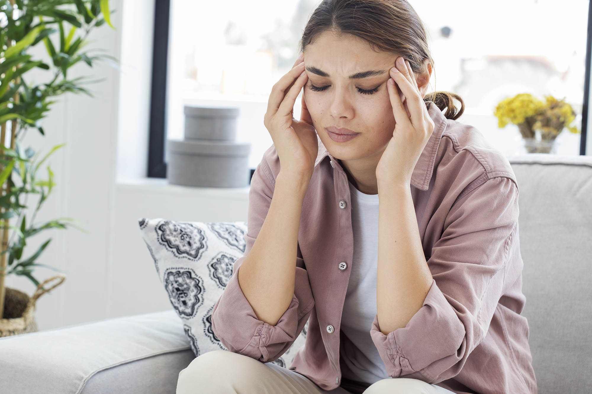 Young woman with headache